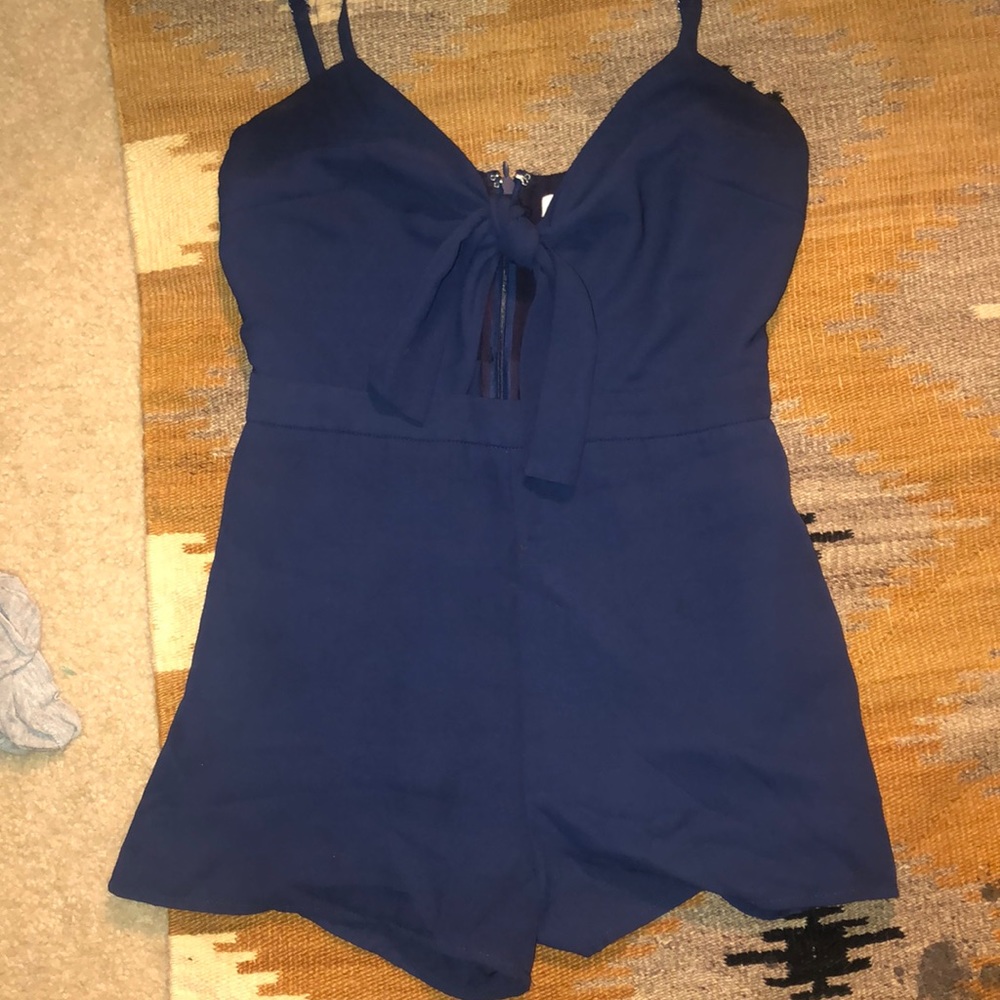 Blue romper with tie in front